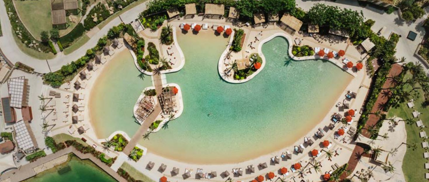 Aerial view of The Beach lagoon pool at La Reserva Club Sotogrande